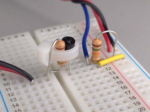 Figure 2: Image of the thermal system with heater tie wrapped to the temperature sensor.