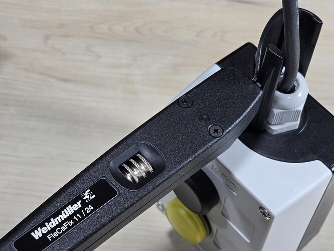 Figure 1: Weidmüller FLECAFIX 11/24 spanner positioned to tighten a cable gland.