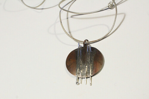 7659449-Falling-Rain-Circular-Copper-and-Silver-Pendant-0