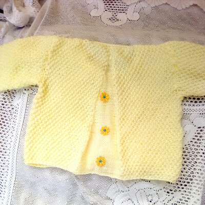 Girl's Knitted White Textured Cardigan with Yellow Daisy Embellishments