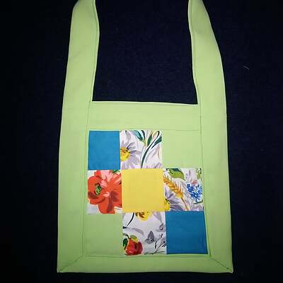 Patchwork shoulder bag in bright lime green with internal pockets. Second