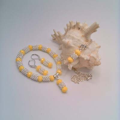 Yellow Faceted Beads and Silver Snowflake Spacers Necklace Bracelet and Earrings