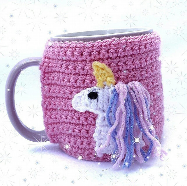 7443273-Hand-crocheted-mug-cosy-pink-with-white-unicorn-with-pink-and-blue-sparky-mane-0