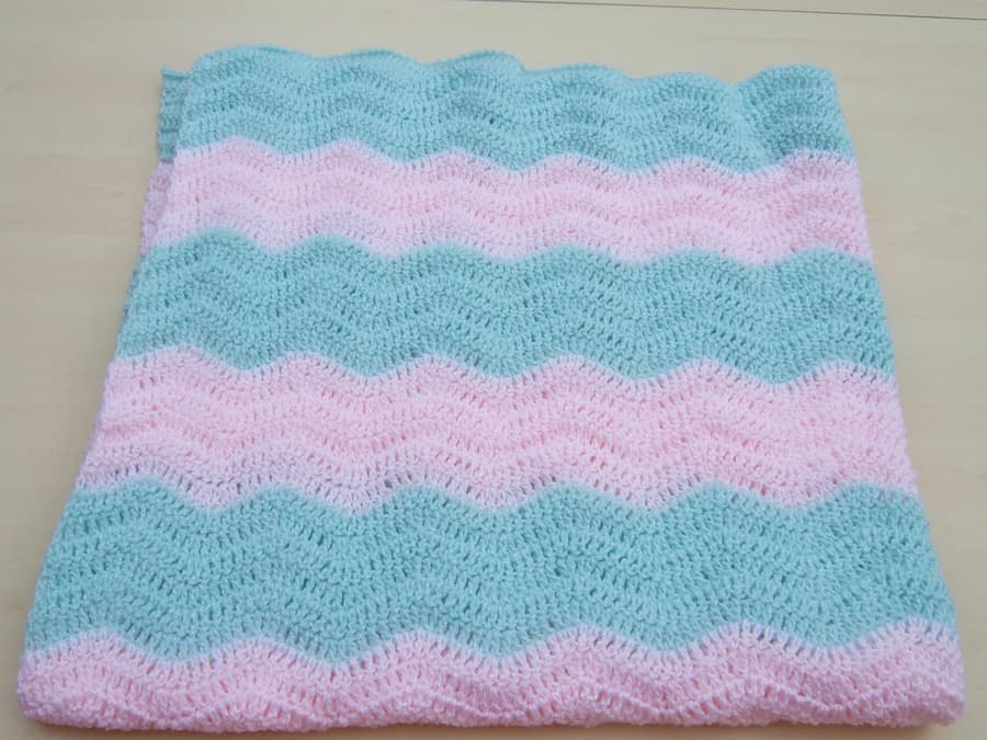 7425516-Baby-ripple-blanket-or-afghan-hand-crochet-in-sparkly-green-and-pink-0