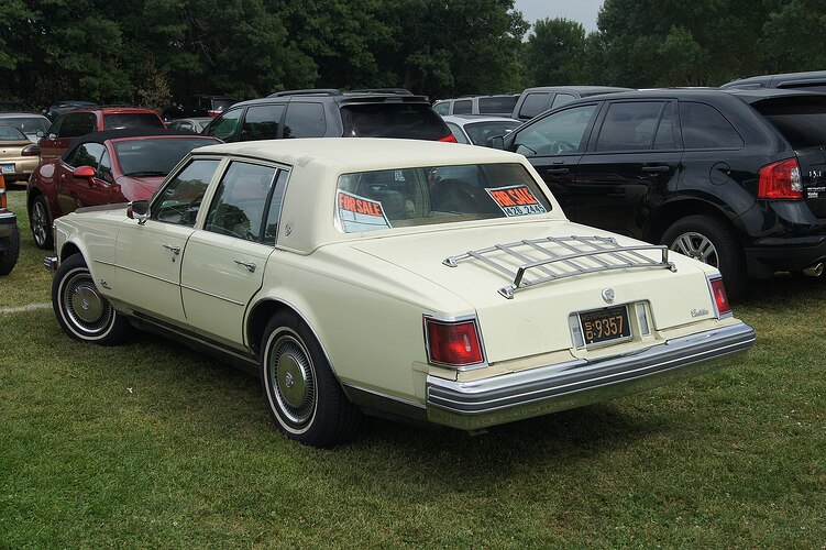 2000px-1976_Cadillac_Seville_(14872604512)