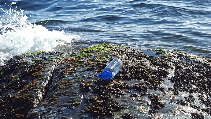 a water bottle by the water