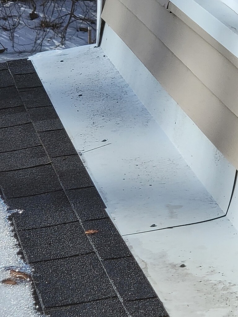 Exposed nails in headwall flashing Roofing Inspections InterNACHI®️