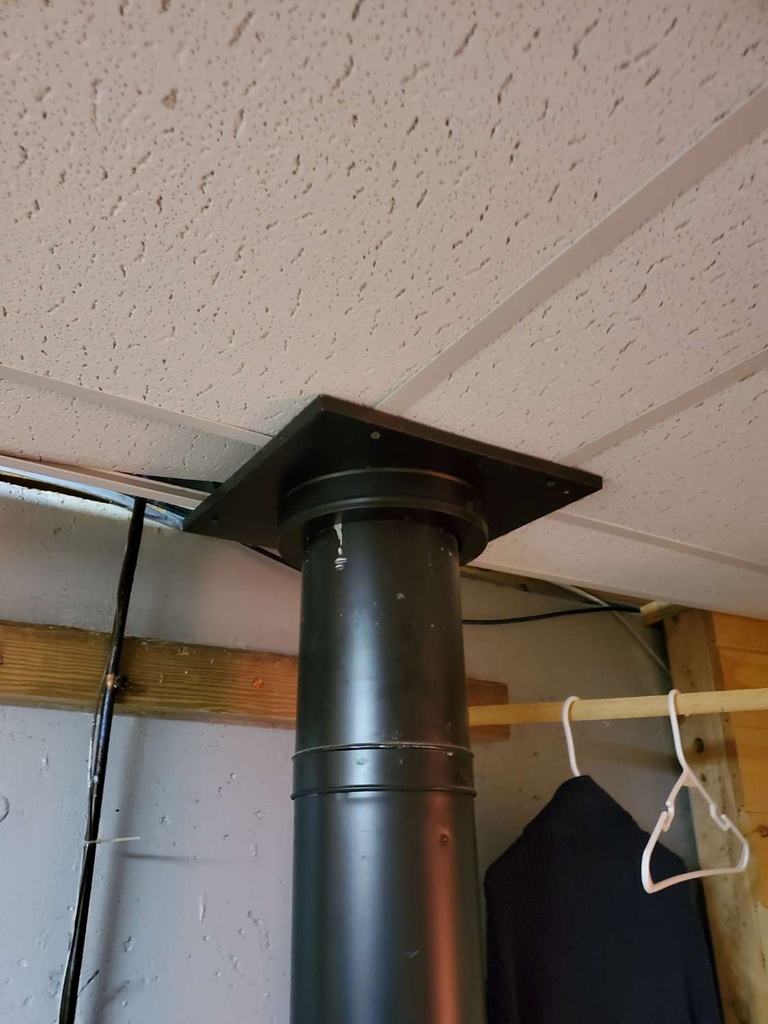 Clearance between gas stove pipe and dropped ceiling panels
