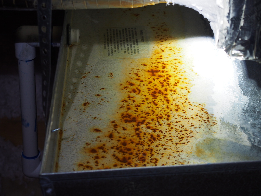 Attic mounded AC evaporator condensate drain makes bubbling sounds