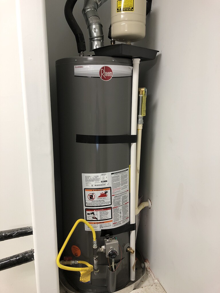 Strange expansion tank overflow pan installation Plumbing Inspections