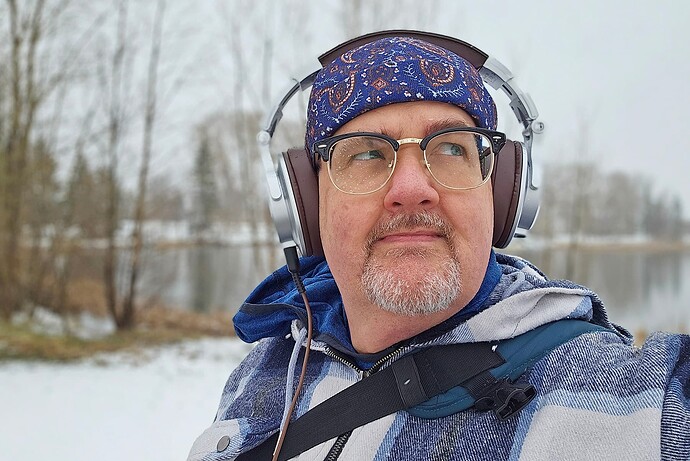 Wondering where his lens cap got to, Kinsmen Lake, Strathmore, AB, 2025-04-20