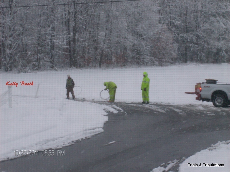 Penelec workers with wires in Nor'Easter