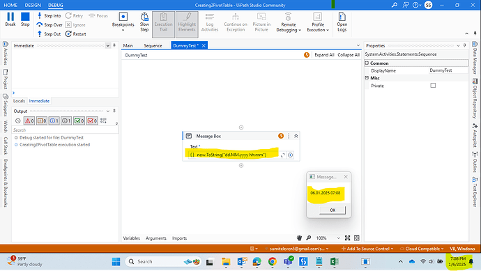 The screenshot shows a UIPath Studio Community project in debug mode, displaying a message box with the current date and time formatted as "dd.MM.yyyy hh:mm". (Captioned by AI)