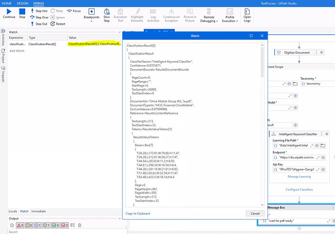 The image displays the UIPath Studio debugger interface with a focus on the watch panel showing detailed classification result data from the Intelligent Keyword Classifier. (由 AI 生成标题)